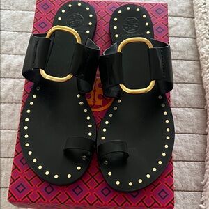Tory Burch Black Sandals with Gold Detailing. In excellent condition